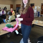 Volunteer Rowan with handmade items