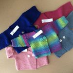 Beautiful hand-knitted baby sweaters
